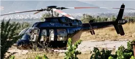  ?? ?? At the scene: The grounded Bell 407 helicopter in Spata, Greece