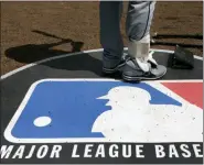  ?? CHARLES REX ARBOGAST - THE ASSOCIATED PRESS ?? FILE - In this April 24, 2013, file photo, Cleveland Indians second baseman Jason Kipnis stands on the Major League Baseball logo that serves as the on deck circle during the first inning of a baseball game between the Chicago White Sox and the Indians, in Chicago.