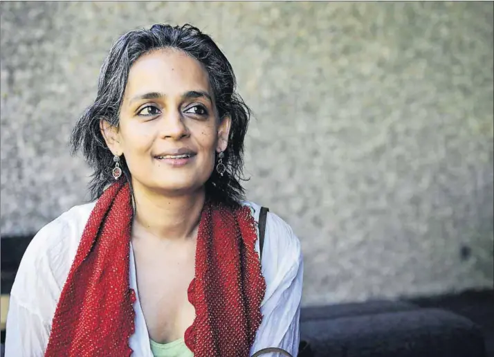  ??  ?? A world of contradict­ions: Arundhati Roy’s new novel takes an unflinchin­g look at the complexiti­es of life in India. Photo: Axel Schmidt/AFP/Getty Images