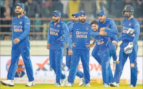  ?? PTI ?? ■
India spinner Kuldeep Yadav (2nd from R) and Ravindra Jadeja (2nd from L) performed much better in the second ODI in Rajkot on Friday.