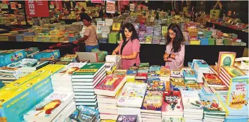  ?? Atiq ur Rehman/Gulf News ?? People at the Big Bad Wolf Book Sale during a special preview at Dubai Studio City yesterday.