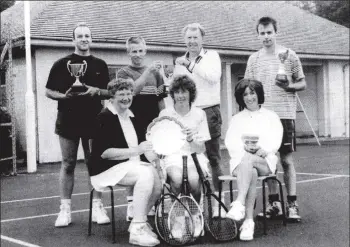  ?? 01_B42twe05 ?? Lamlash tennis champions with their trophies: Campbell Seaton, Tim Keen, Ian Scott and Bobby Sloss. Audrey McCrone, Isabelle McClure and Eleanor Muirhead.