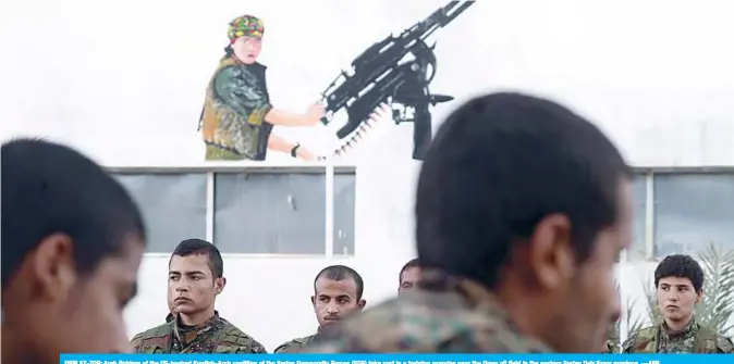  ?? —AFP ?? DEIR EZ-ZOR: Arab fighters of the US-backed Kurdish-Arab coalition of the Syrian Democratic Forces (SDF) take part in a training exercise near the Omar oil field in the eastern Syrian Deir Ezzor province.