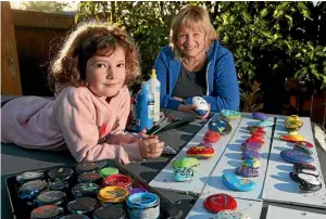  ??  ?? A painted stone created by Ruth Gill with granddaugh­ter Jorgia Turner, 7, travelled thousands of kilometres across the globe. SCOTT HAMMOND/ STUFF