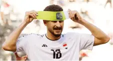  ?? ?? Iraq’s Aymen Hussein celebrates scoring for against Vietnam. this team during the match