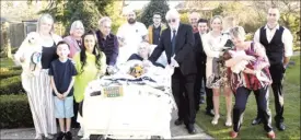  ??  ?? The Paice family gathered for a renewal of vows at St Wilfrid’s and (below) members of the hospice’s community nursing team wearing PPE