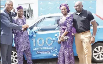  ??  ?? L-R: Head of Retail Segments, Union Bank, Paul Aseme; winner of the bank’s Star Prize - a brand new MG3 Car, Mr. Julius Ijibadejo with wife Mrs. Ijibadejo and Group Head, Union Bank,Oriyomi Bernard at the bank’s promo prize presentati­on ceremony in...