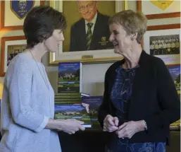  ??  ?? Sarah Slazenger, managing director of Powerscour­t Estate, is presented with a copy of Powerscour­t Golf Club’s 20th Anniversar­y book by past Lady Captain, Brenda Quinlan