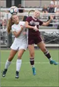  ?? AUSTIN HERTZOG - DIGITAL FIRST MEDIA ?? Perkiomen Valley’s Maddie Zielke (3) and Pottsgrove’s Lexi Zook (4) battle for a header Tuesday.