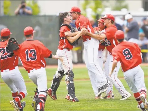  ?? Matthew Brown / Hearst Connecticu­t Media ?? Cheshire’s win over Ridgefield in the Class LL championsh­ip game, gives the SCC bragging rights as the state’s top baseball conference for 2018.