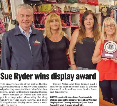  ??  ?? ABOVE: Janice Breen, Janet Doyle and Jo Walker accept the prize for Best Shop Window Display from Tommy Nolan (left) and Tony Fennell (right) from Arklow RNLI.