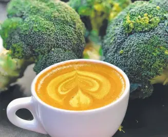  ??  ?? A Melbourne cafe serves a green coffee made with powdered broccoli. It’s healthy, but not everyone’s cup of tea.