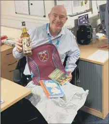  ??  ?? HUMBLED Steve Jones with his retirement gifts