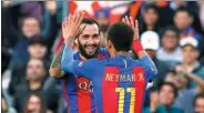  ?? ALBERT GEA / REUTERS ?? Barcelona's Aleix Vidal celebrates with teammate Neymar after netting his side’s third goal in a 3-0 win over Athletic Bilbao at Camp Nou on Saturday.