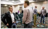  ?? RALPH BARRERA / AMERICAN-STATESMAN ?? Republican Matt McCall (left), running for the U.S. Congressio­nal District 21 seat, greets San Marcos resident Brian Olson at a candidate forum in San Marcos last week.