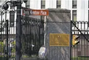  ?? Carolyn Kaster / Associated Press ?? A plaza named after a slain critic of Vladimir Putin faces the Russian Embassy in Washington.