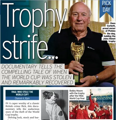  ?? ?? Dave Corbett, proud owner of Pickles
the dog, holding the Jules Rimet
trophy