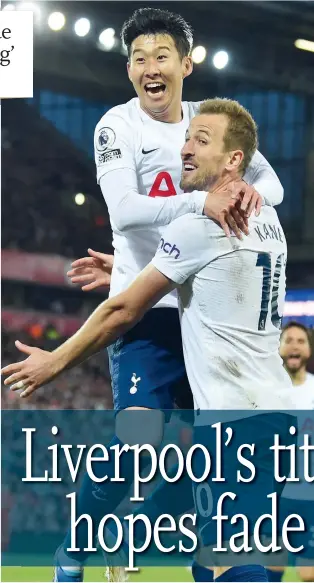  ?? Photo: VCG ?? Tottenham Hotspur’s South Korean striker Son Heung- min ( left) celebrates with English striker Harry Kane after scoring the opening goal of the match against Liverpool at Anfield in Liverpool, England on May 7, 2022.
