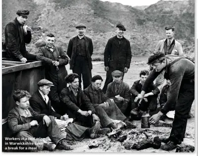  ??  ?? Workers in a coal mine in Warwickshi­re take a break for a meal