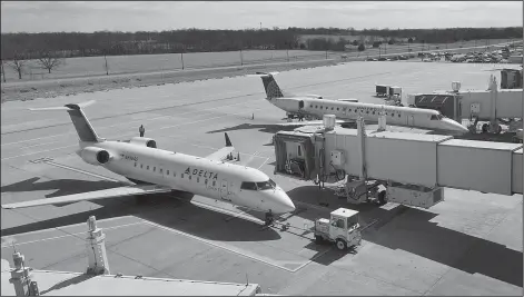  ?? NWA Democrat-Gazette/BEN GOFF ?? Airplanes sit at the gateon Thursday March 3, 2016 at Northwest Arkansas Regional Airport in Highfill.