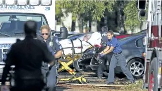  ?? AMY BETH BENNETT/AP ?? A woman is transporte­d from The Rehabilita­tion Center at Hollywood Hills on Wednesday as patients are evacuated after a loss of air conditioni­ng due to hurricane Irma in Hollywood, Fla. Several patients at the sweltering nursing home died in the...