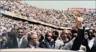  ??  ?? Tambo receives a rousing welcome at an ANC rally at King’s Park Stadium in Durban in 1991.