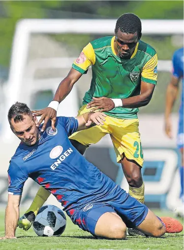  ?? Picture: ANESH DEBIKY/GALLO IMAGES ?? FIERY TUSSLE: Danny Phiri of Golden Arrows, right, shakes off a sliding tackle from SuperSport’s Bradley Grobler during their Absa Premiershi­p match at the Sugar Ray Xulu Stadium in Durban on Sunday