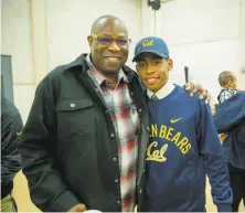  ?? Courtesy Jesuit High School ?? Former Giants manager Dusty Baker poses with his son Darren after Darren signed to play baseball at Cal.