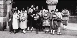  ?? ED CLARK/GETTY FILE ?? The first group of African American students to integrate into Norfolk’s public schools — later dubbed the Norfolk 17 — pose for a photograph together in 1958.