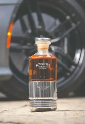  ?? BEAM SUNTORY ?? A highly coveted bottle of the rare Black Bowmore 1964 DB5 31-year old scotch whisky
will be going up for sale at Ontario's LCBO for $85,000 — plus a 20-cent deposit.