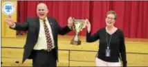  ?? SUBMITTED PHOTO ?? Superinten­dent Lawrence Mussoline presented the trophy for best mascot in the “Mascot Madness” challenge to Shamona Creek Principal Norma Jean Welsh and the student body.