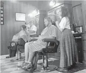  ?? DEWAYNE BEVIL/STAFF ?? The three-chair Harmony Barber Shop has been in operation since the park opened in 1971.