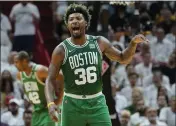  ?? LYNNE SLADKY — THE ASSOCIATED PRESS ?? Celtics guard Marcus Smart gestures during the first half of Game 2of the Eastern Conference finals against the Heat on Thursday in Miami.