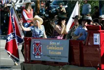  ?? Rick WileyArizo­na Daily Star via AP ?? In this Feb. 20 photo, the Sons of Confederat­e Veterans float participat­es in the 2020 La Fiesta de los Vaqueros Tucson Rodeo Parade in Tucson, Ariz.