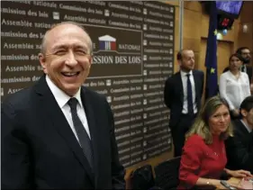  ?? AP PHOTO/FRANCOIS MORI ?? French Interior Minister Gerard Collomb (left) arrives for a hearing with the deputies of the Laws Commission concerning the case of President Macron’s security aide Alexandre Benalla, at the National Assembly in Paris, France, on Monday.