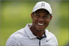  ?? ERIC GAY — THE ASSOCIATED PRESS ?? Tiger Woods on the driving range before a practice round for the PGA Championsh­ip on May 17 in Tulsa, Okla.