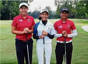  ??  ?? Ready and eager to tee-off in the RSGC Ladies Amateur Open (from left) Winnie Ng Yu Xuan, Warda Amira and Noraishah Alisa.