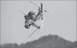  ?? Associated Press photo ?? Alex Beaulieu-Marchand, of Canada, flies through the air in men's ski slopestyle qualificat­ions at Phoenix Snow Park during the 2018 Olympic Winter Games in Pyeongchan­g, South Korea, Sunday.