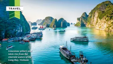  ??  ?? Limestone pillars and islets rise from the emerald waters of Ha Long Bay, Vietnam