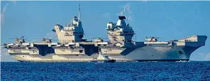  ?? ?? At sea: HMS Queen Elizabeth has set sail with no fighter jets on board