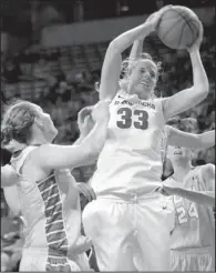  ?? NWA Media/J.T. WAMPLER ?? Arkansas forward Melissa Wolff (33) comes down with a rebound during Thursday’s game against South Dakota State at Walton Arena in Fayettevil­le. South Dakota won 80-75 in overtime.