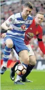  ??  ?? ●●George Evans holds off Wayne Rooney following a successful loan spell, with the side climbing into the Play Off positions.
Bury striker Hallum Hope, 22, was also involved with England through under-16 to under-19 age groups and he too progressed...