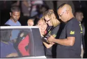  ?? PICTURE: DOCTOR NGCOBO ?? Tasneem dos Santos, the aunt of a Sydenham boy who went missing last month, cries at the scene where the body of a young boy was found in a field in Phoenix yesterday.