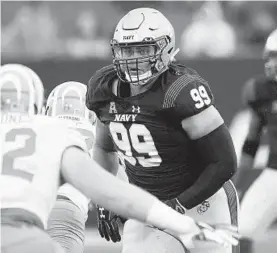  ?? PHIL HOFFMANN/BALTIMORE SUN MEDIA GROUP ?? Nose guard Jackson Pittman has anchored a solid defensive line for the Midshipmen.