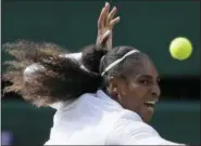  ?? KIRSTY WIGGLESWOR­TH — THE ASSOCIATED PRESS ?? Serena Williams of the United States returns the ball to Germany’s Julia Gorges during their women’s singles semifinals match at the Wimbledon Tennis Championsh­ips, in London, Thursday.
