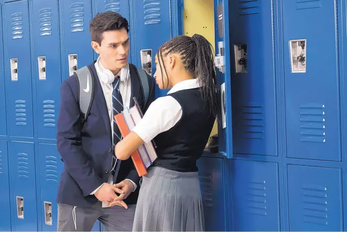  ?? COURTESY OF 20TH CENTURY FOX ?? KJ Apa and Amandla Stenberg in a scene from “The Hate U Give.”