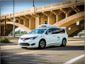  ?? WAYMO VIA AP ?? THIS UNDATED PHOTO minivan. provided by Waymo shows its selfdrivin­g