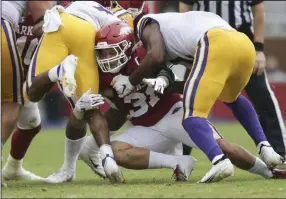  ?? (NWA Democrat-Gazette/Charlie Kaijo) ?? Arkansas senior linebacker Grant Morgan, who ranks fourth in the nation with 12.3 tackles per game, was named as one of 67 nominees Monday for the Burlsworth Trophy, which is given annually to the nation’s top college football player who began his career as a walk-on.