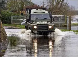  ??  ?? On a recce: 24 Commando driving in Burrowbrid­ge yesterday