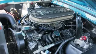  ??  ?? The immaculate engine compartmen­t of Scott Ferguson’s restored 1968 Cougar XR7–G.